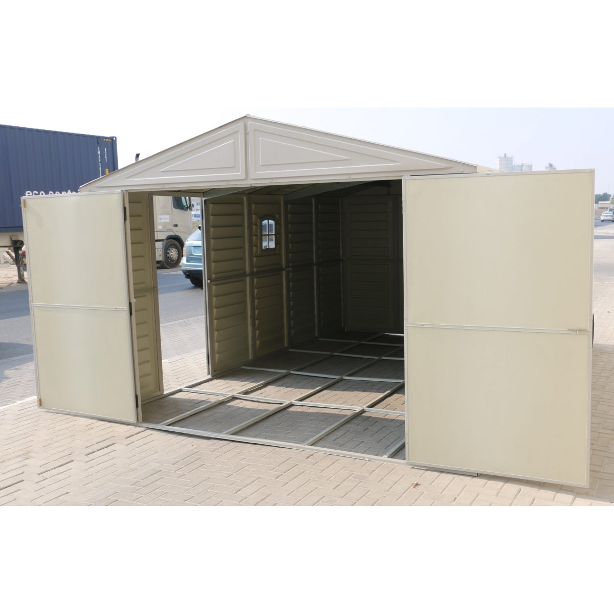 DuraMax | Woodbridge Vinyl Standalone Garage or Storage Building With Foundation Kit - 10.5 ft Wide