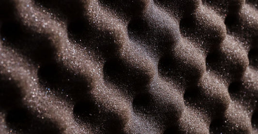 Close-up view of wavy acoustic foam for sound absorption and insulation.