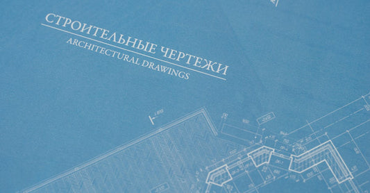 Close-up of detailed blueprints highlighting architectural design elements.